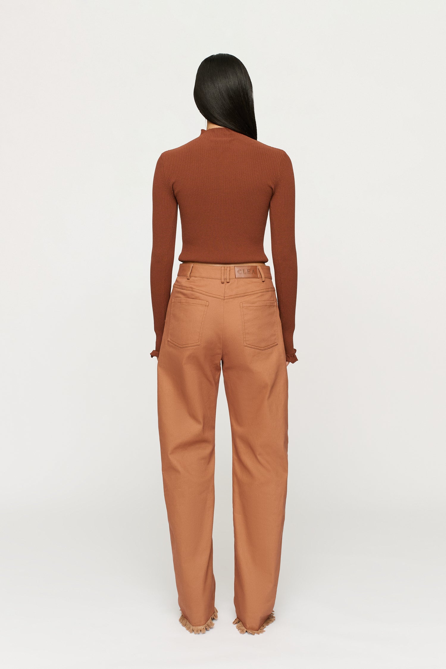 ALINA RUFFLE HEM KNIT