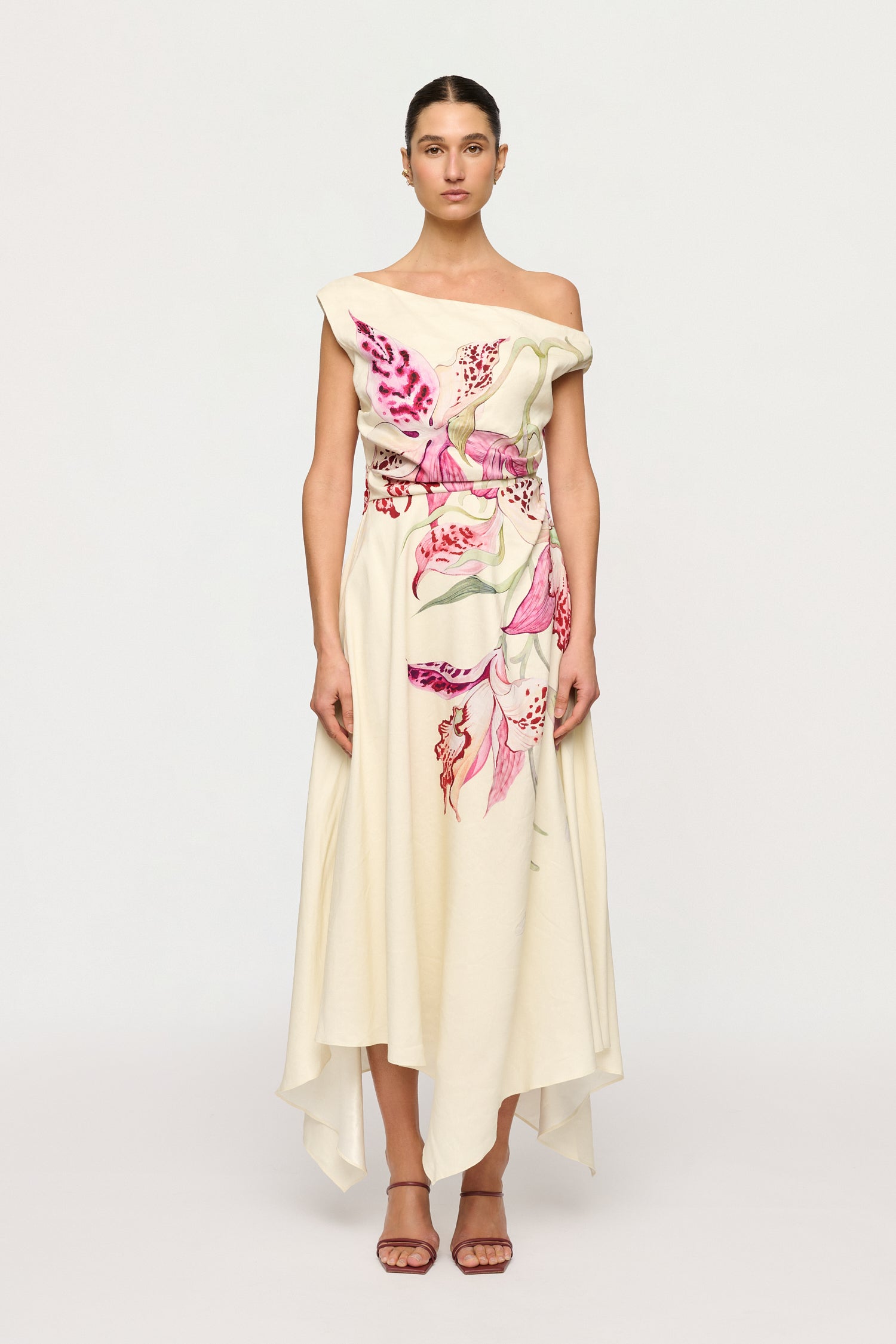 Woman wearing a floral off-shoulder dress on a white background designed by Kuro Neko